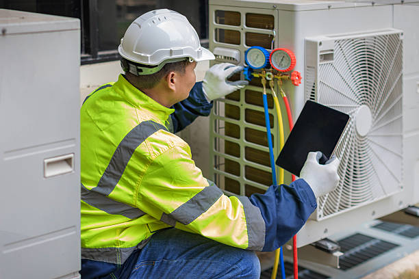 Professional Heat Pump Repair technician working in Highland, CA